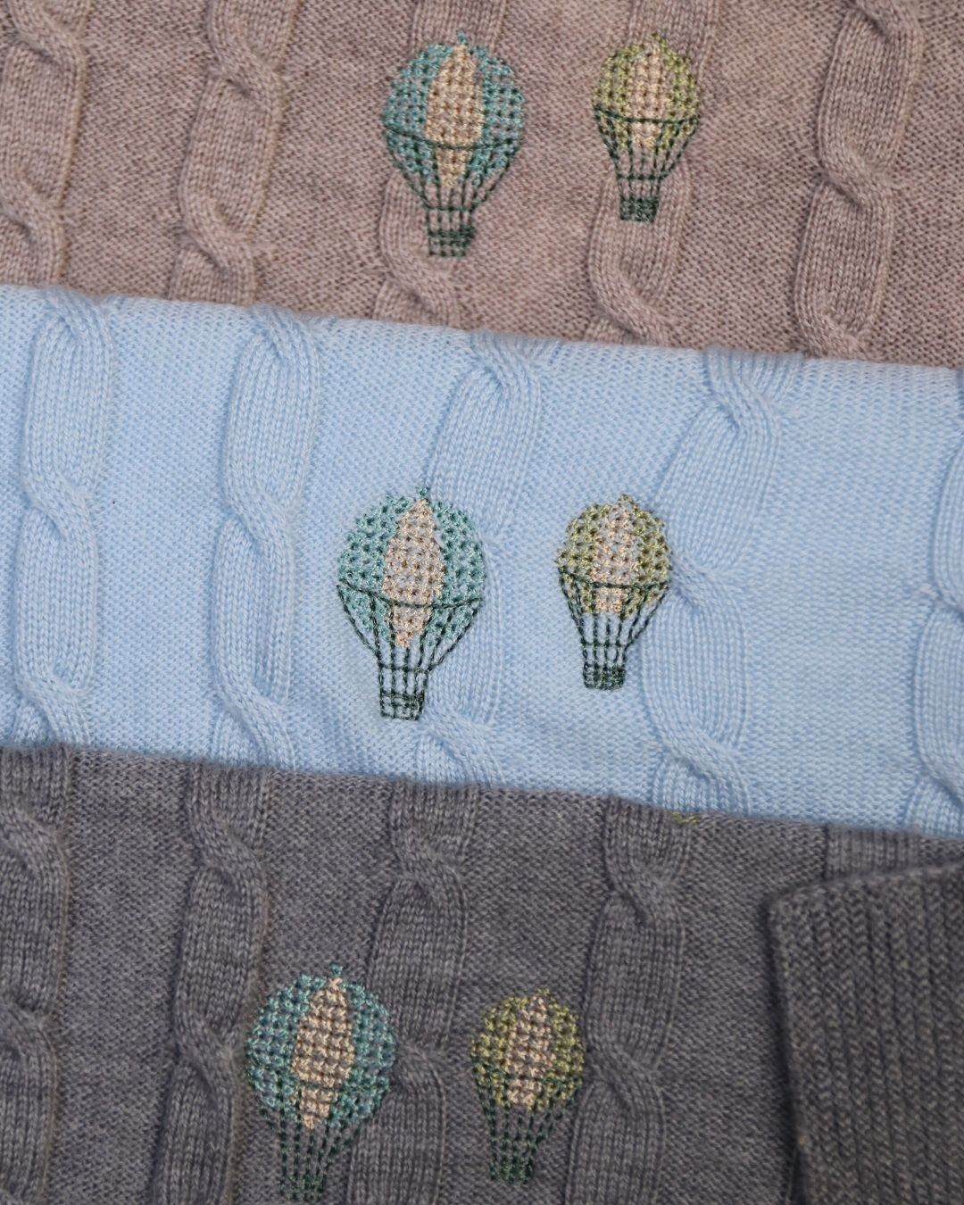 Merino Baby Blanket with vintage hot air balloon embroidery design.