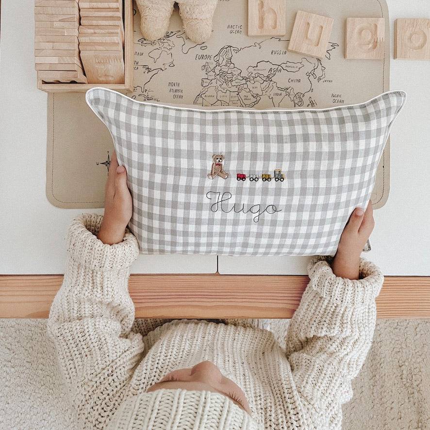 Choo Choo Train Linen Cushion with teddy and colorful train embroidery, customizable text, crafted in New Zealand.