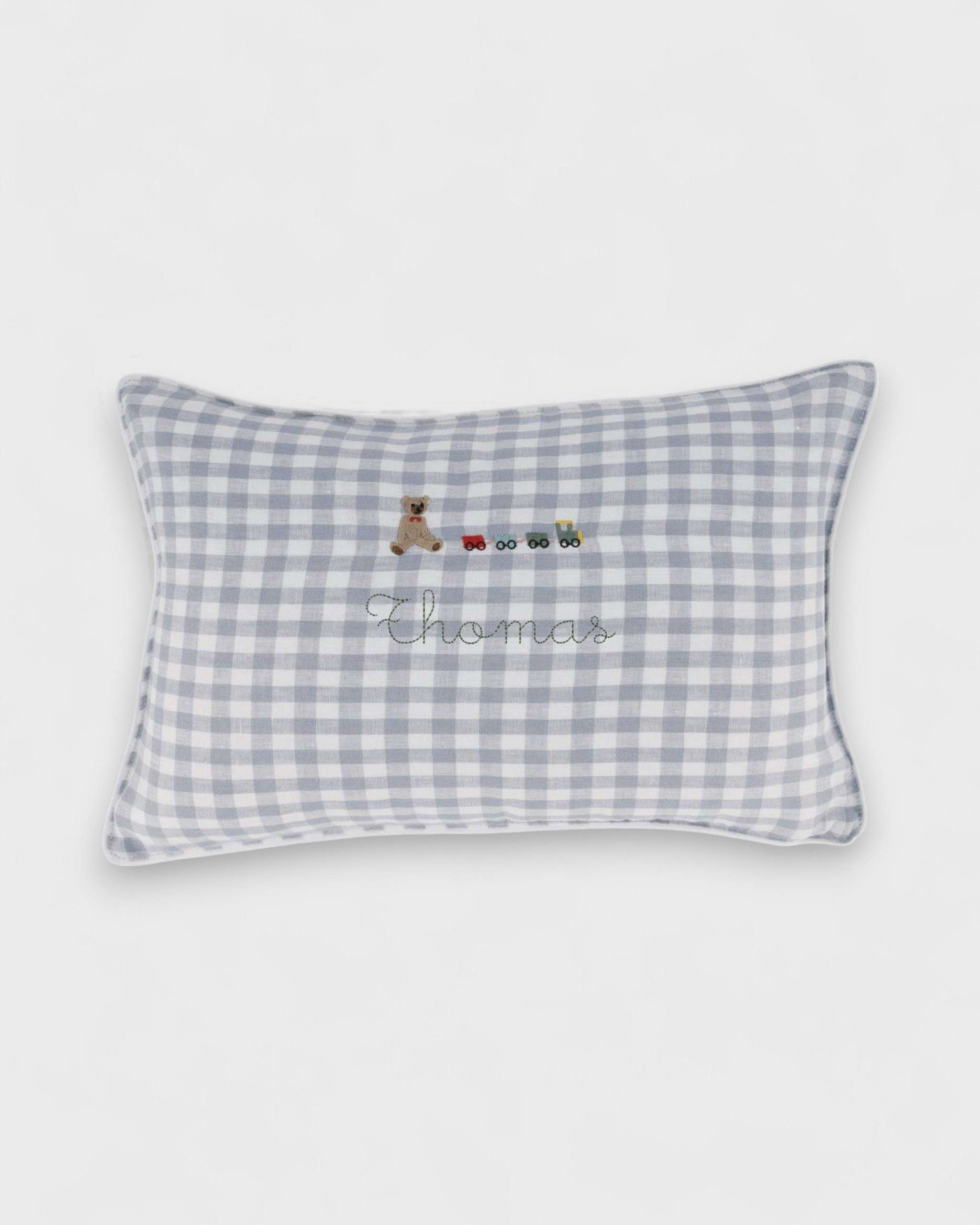 Choo Choo Train Linen Cushion with teddy and train embroidery on checkered fabric.