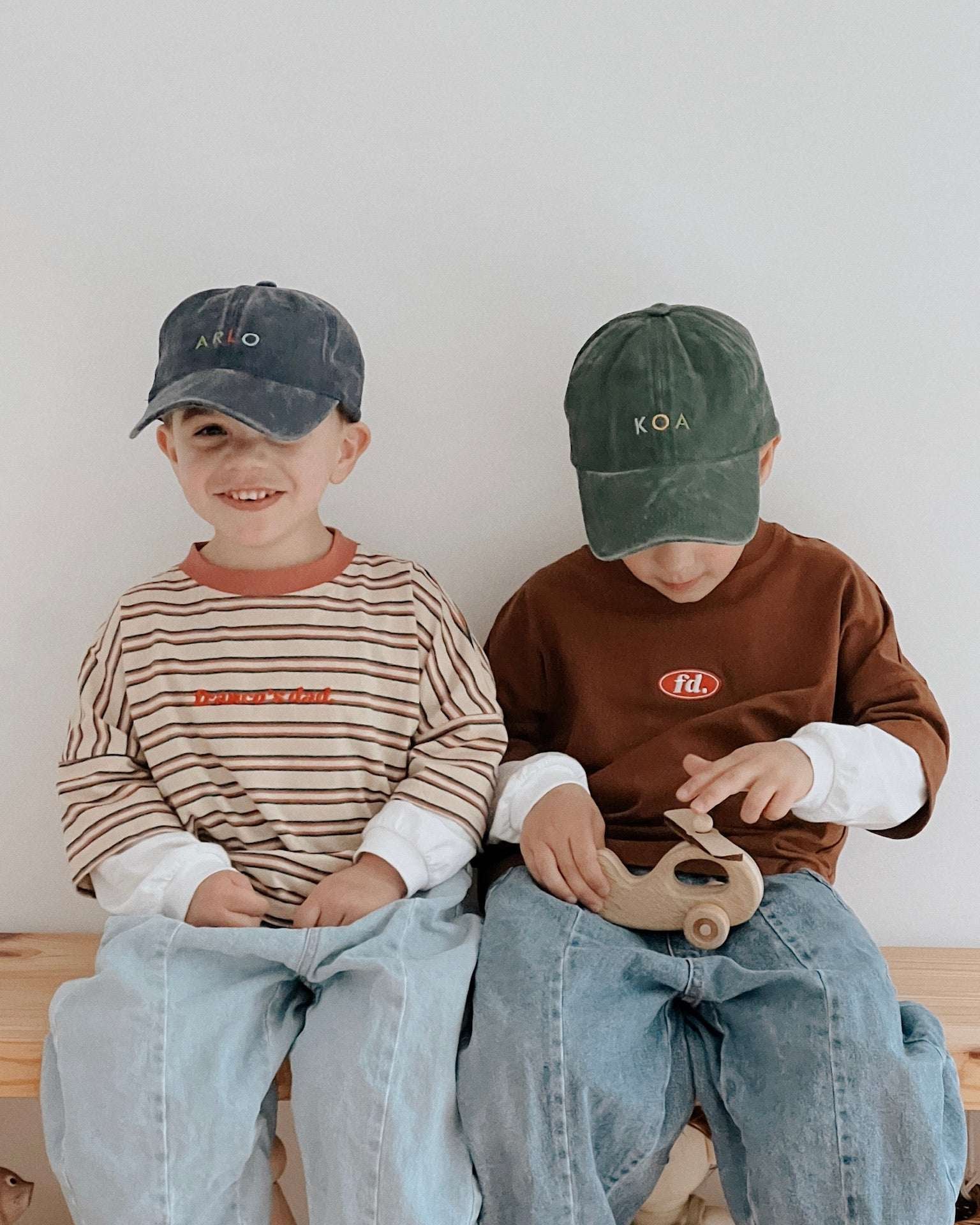 Personalised hat with multi-coloured text, classic baseball fit, 100% washed cotton.