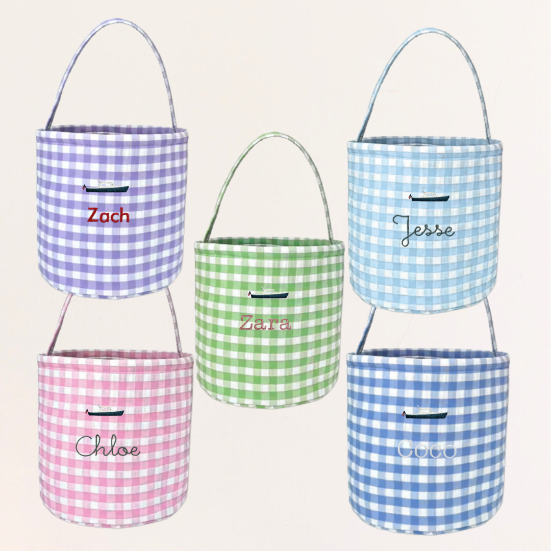 Personalised gingham Easter buckets with hand-drawn embroidery in various colors, ideal for toy storage.