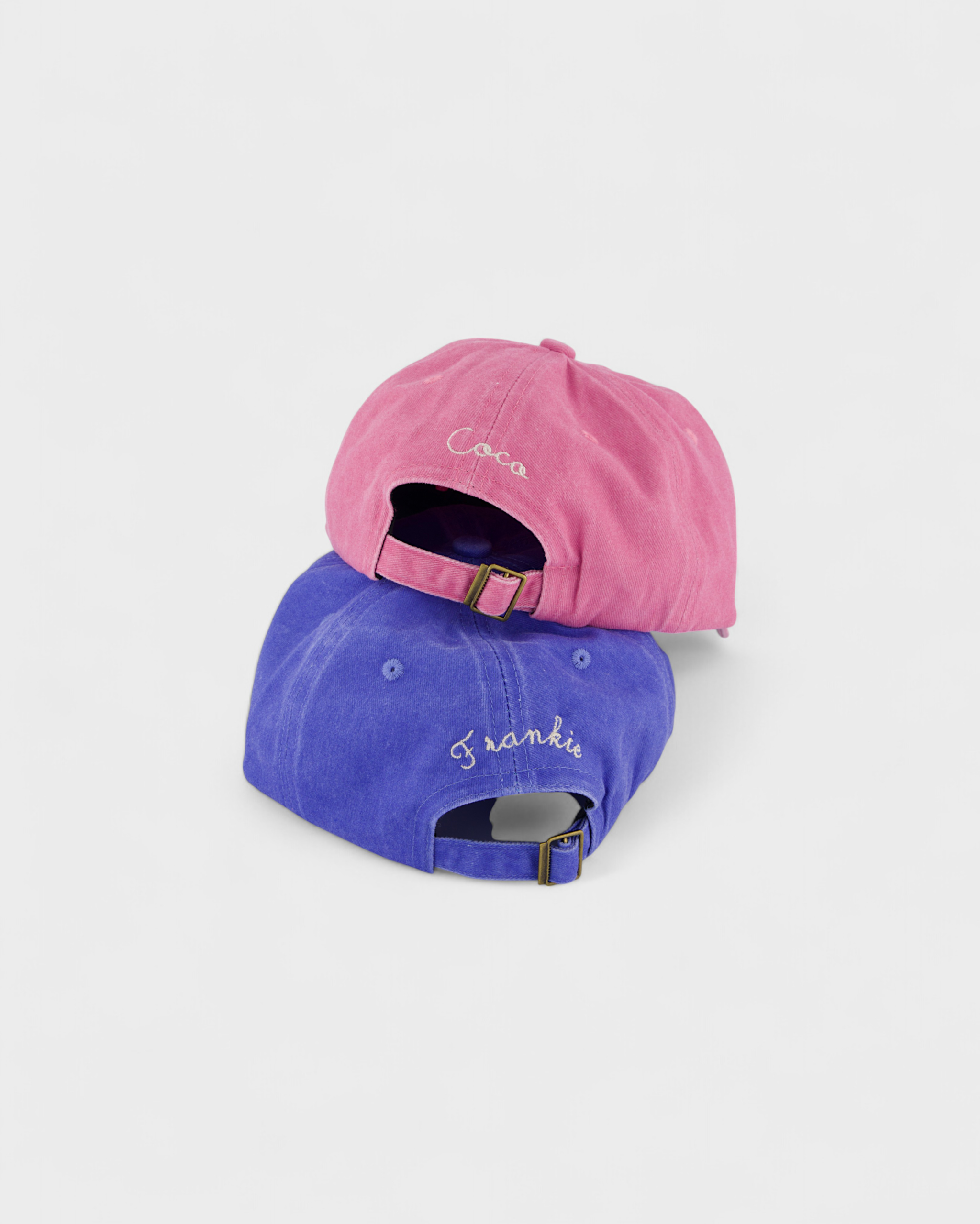 Pink and blue Yorkie personalised hats with custom embroidery.