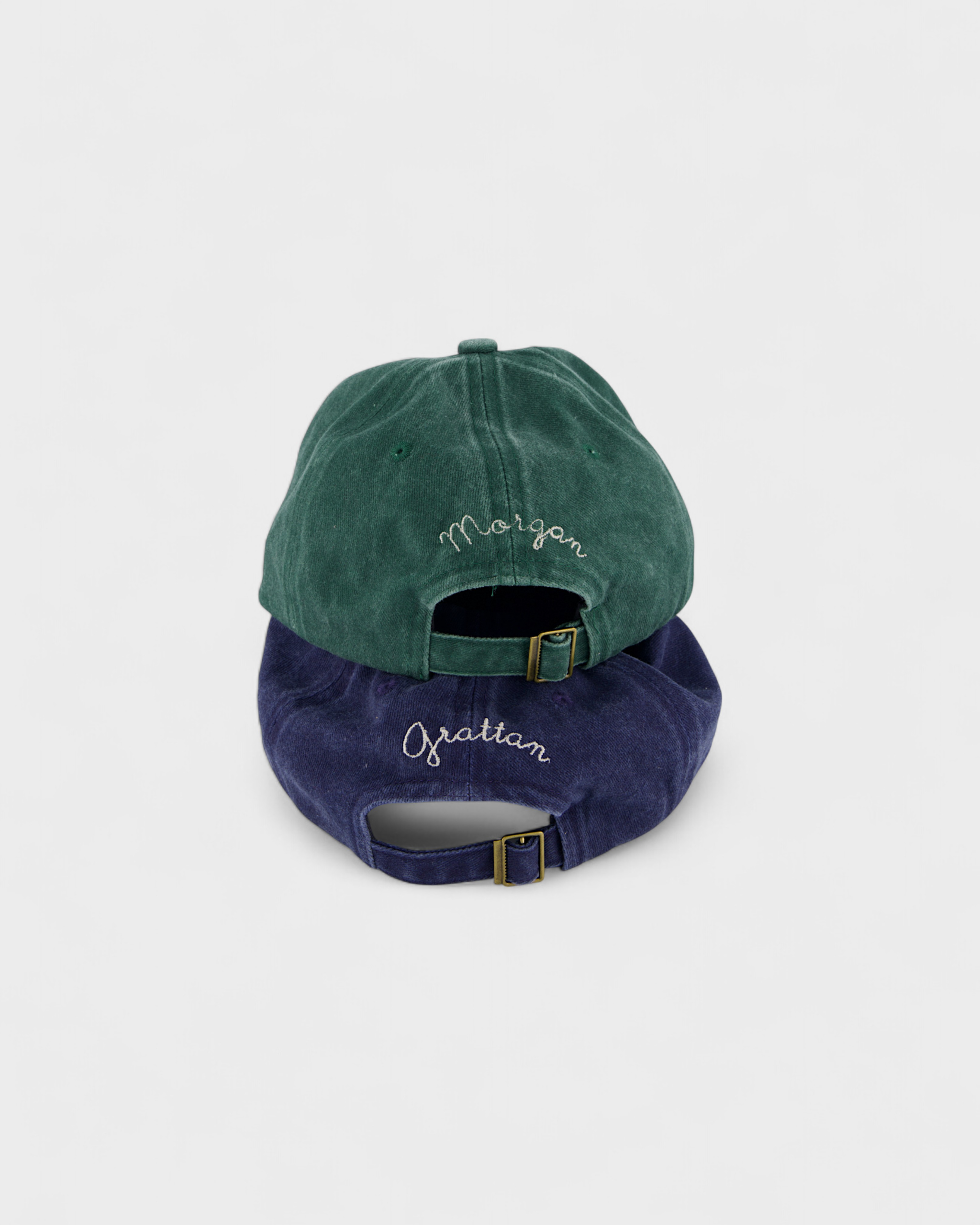 Doberman Personalised Hat with embroidered names on the back in green and blue cotton.