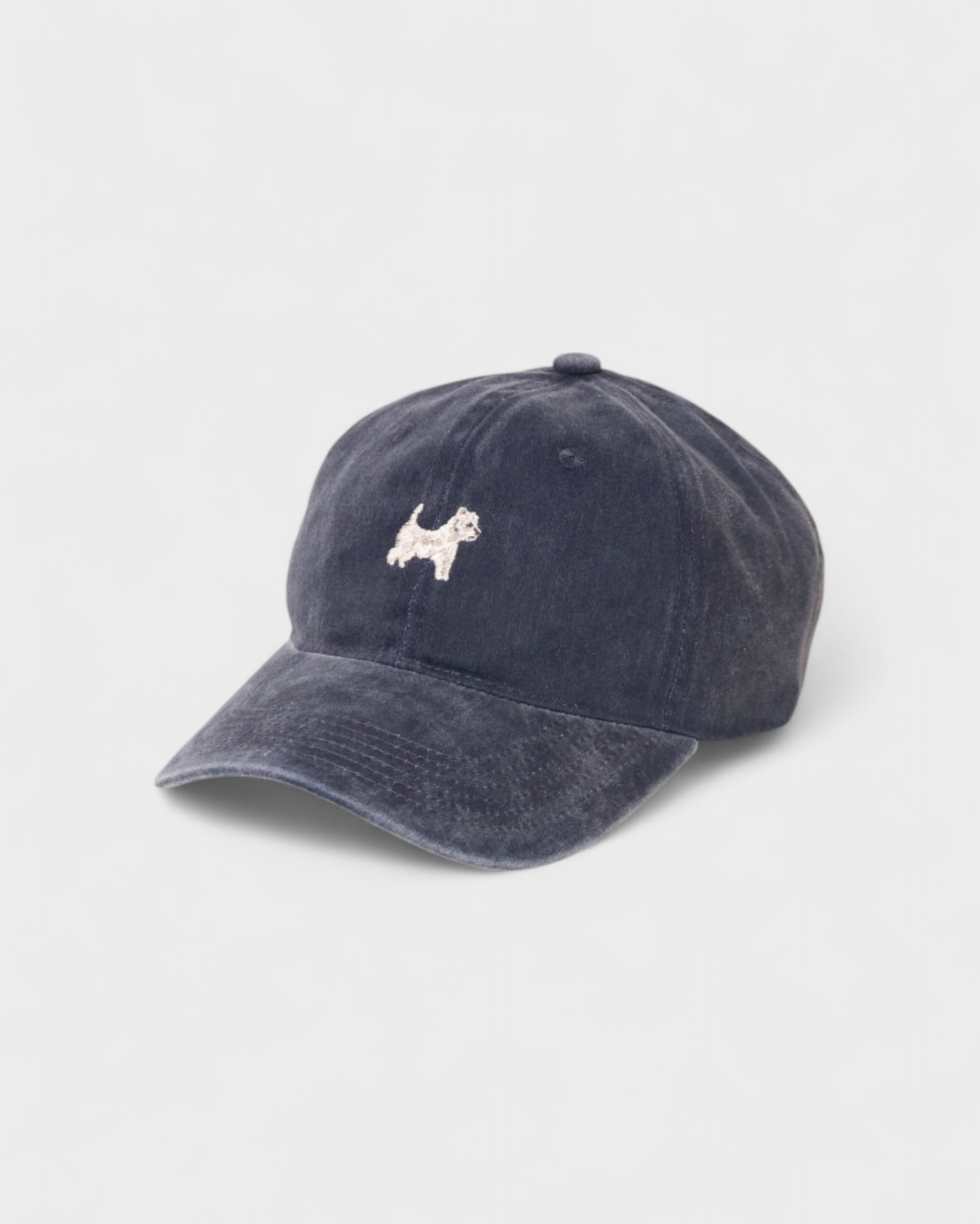 Navy blue personalised hat with embroidered West Highland White Terrier design on front and customizable embroidery on back, made of 100% washed cotton.