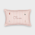 Nautical cushion with pink gingham linen, embroidered sea-themed designs, and personalized name "Olive"