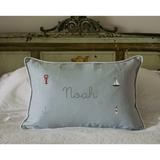 Duck egg blue gingham linen nautical cushion with embroidered sea-themed designs and personalized name Noah.