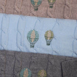 Merino Baby Blanket with vintage hot air balloon embroidery design.