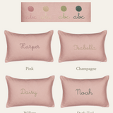 Personalized pink linen cushion options with embroidered names in various thread colors including pink, champagne, willow, and dark teal.