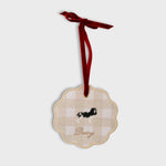 Custom pet ornament with embroidered dog and personalized name on gingham fabric with red velvet ribbon for hanging
