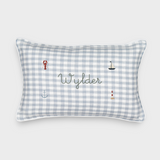 Duck egg blue gingham linen nautical cushion with embroidered sea-themed designs and personalized name Wylder