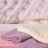 Merino Baby Blanket with Rosette Design in cream, pink, and purple, featuring soft, breathable merino wool and vintage-inspired rose embroidery.
