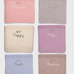 Merino wool baby blankets with personal embroidery and balloon design.