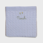 Merino baby blanket with balloon design and personalized embroidery.
