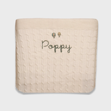Merino baby blanket with personalized embroidery and vintage hot air balloon design.