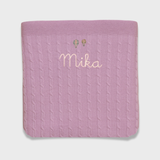 Merino baby blanket with balloon embroidery design and personalized name.