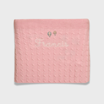 Merino baby blanket with balloons design and personalized embroidery.