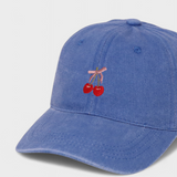 Blue personalised hat with embroidered cherries and pink bow design.