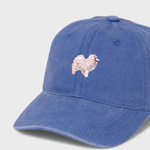 Blue baseball hat with embroidered Japanese Spitz design and customizable back embroidery