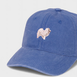 Blue baseball hat with embroidered Japanese Spitz design and customizable back embroidery