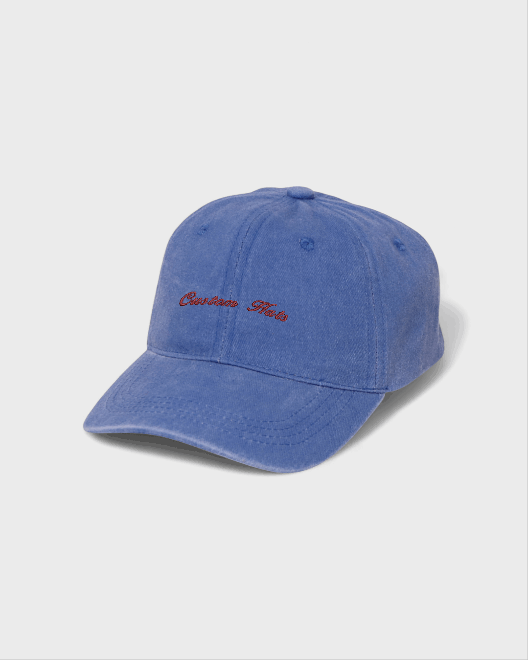 Blue customised baseball cap made of 100% washed cotton with personalised embroidery.
