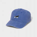 Blue baseball cap with hand-embroidered King Charles Spaniel design and personalized back embroidery, made of 100% washed cotton.