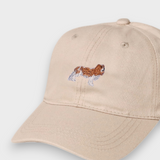 Beige baseball cap with embroidered King Charles Spaniel design and personalized embroidery option.