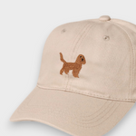 Beige baseball cap with embroidered brown Cocker Spaniel design on the front, personalised embroidery option on the back, made of 100% washed cotton.