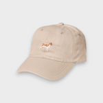 Beige Brittany Spaniel personalised baseball hat with embroidered dog design on front made of 100% washed cotton
