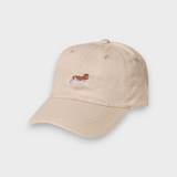 Beige baseball cap with hand-embroidered King Charles Spaniel design on front, personalised embroidery option on back, made from 100% washed cotton.