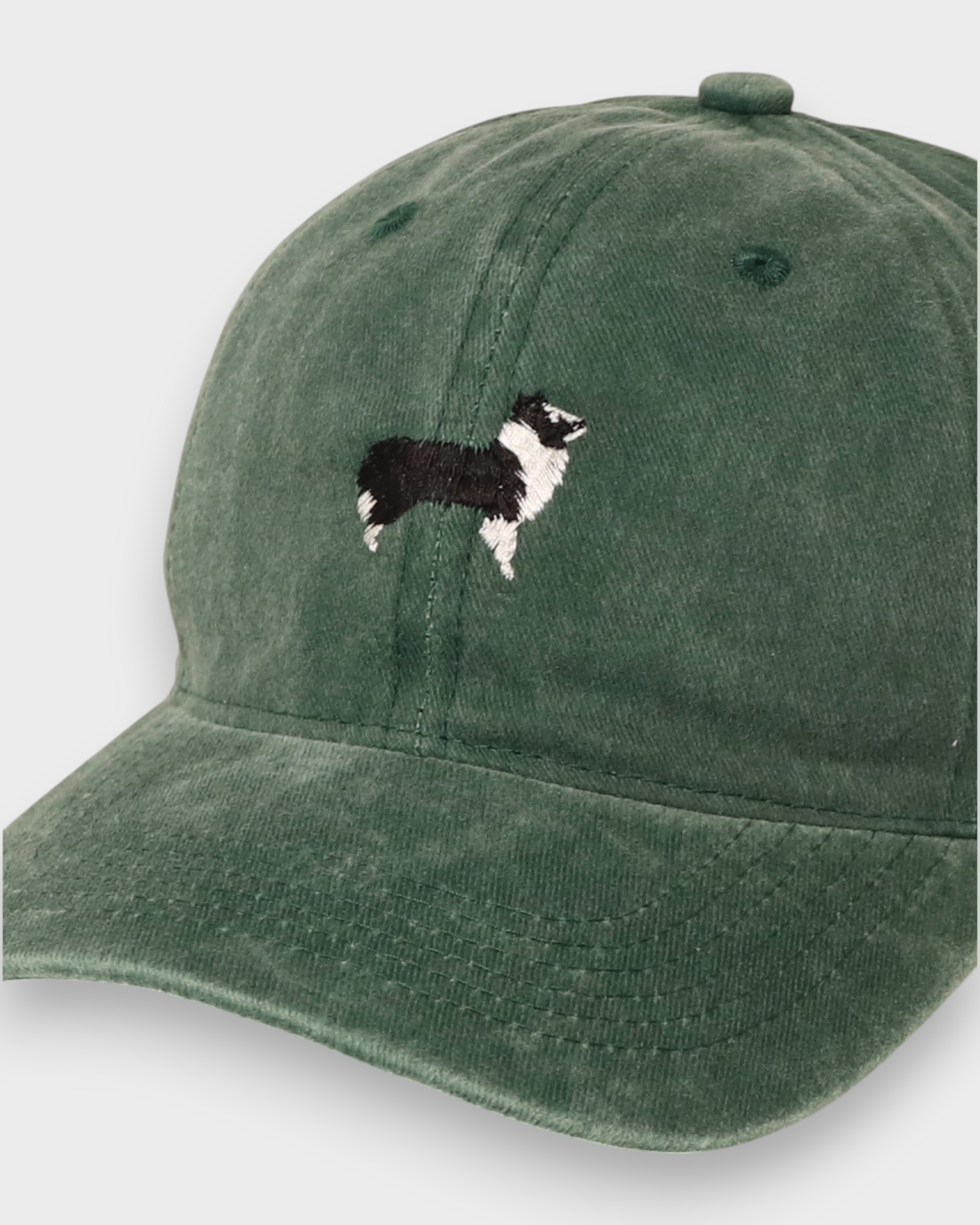 Border Collie embroidered personalised green hat in washed cotton baseball style.