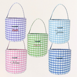 Personalised gingham Easter buckets with hand-drawn embroidery in various colors, ideal for toy storage.