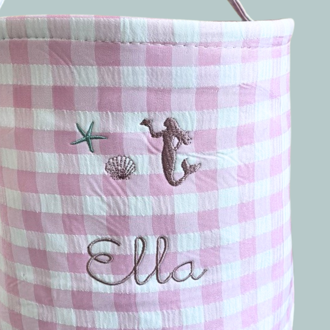 Personalised Easter bucket with mermaid embroidery and gingham pattern.
