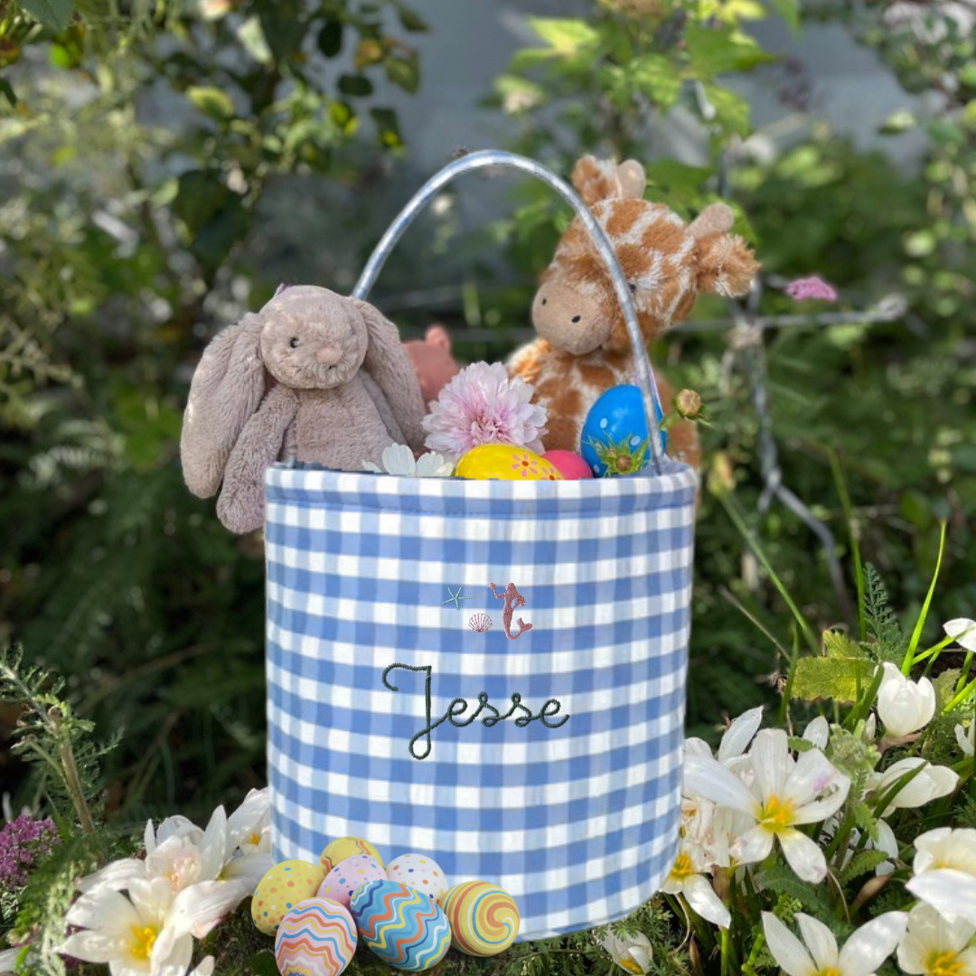 Mermaid-themed personalised Easter bucket with toys and eggs, blue gingham design.