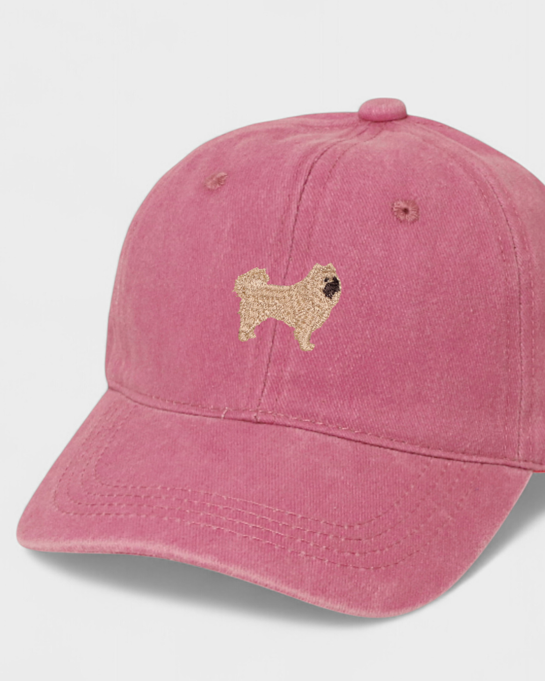 Husky personalised hat with embroidered Chow Chow design on pink cotton baseball cap.