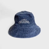 TMC Personalised Bucket Hat made of blue washed cotton with embroidered logo.