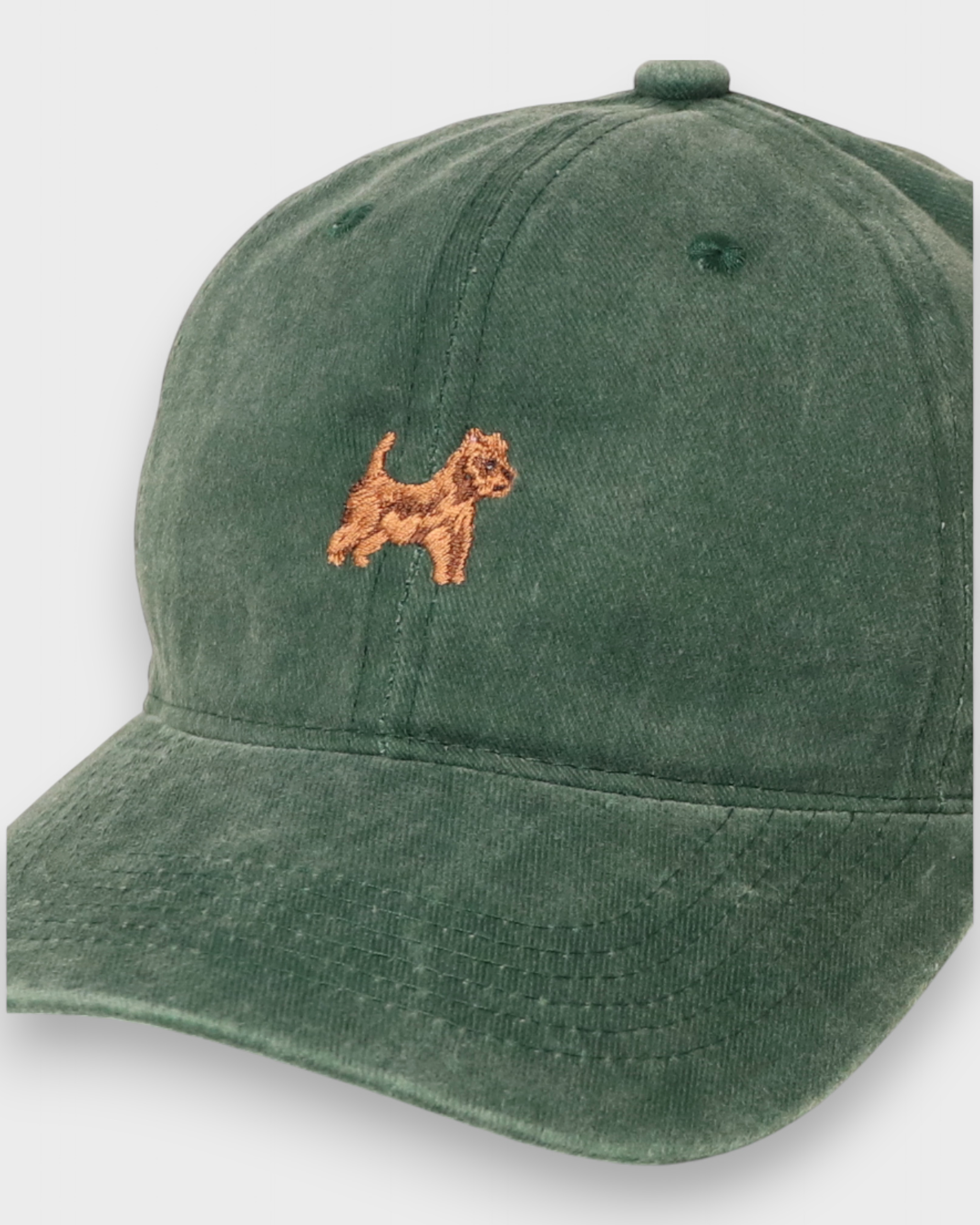 Australian Terrier personalised hat with embroidered dog design on green cotton fabric.