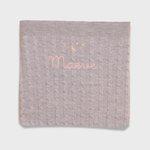 Merino baby blanket with moon and stars embroidery design.