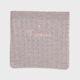 Merino baby blanket with moon and stars embroidery design.
