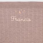 Merino Baby Blanket with moon and stars design and embroidered personalization.