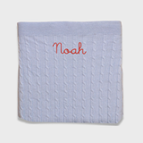 Merino Baby Blanket with custom embroidery, soft wool for year-round warmth.