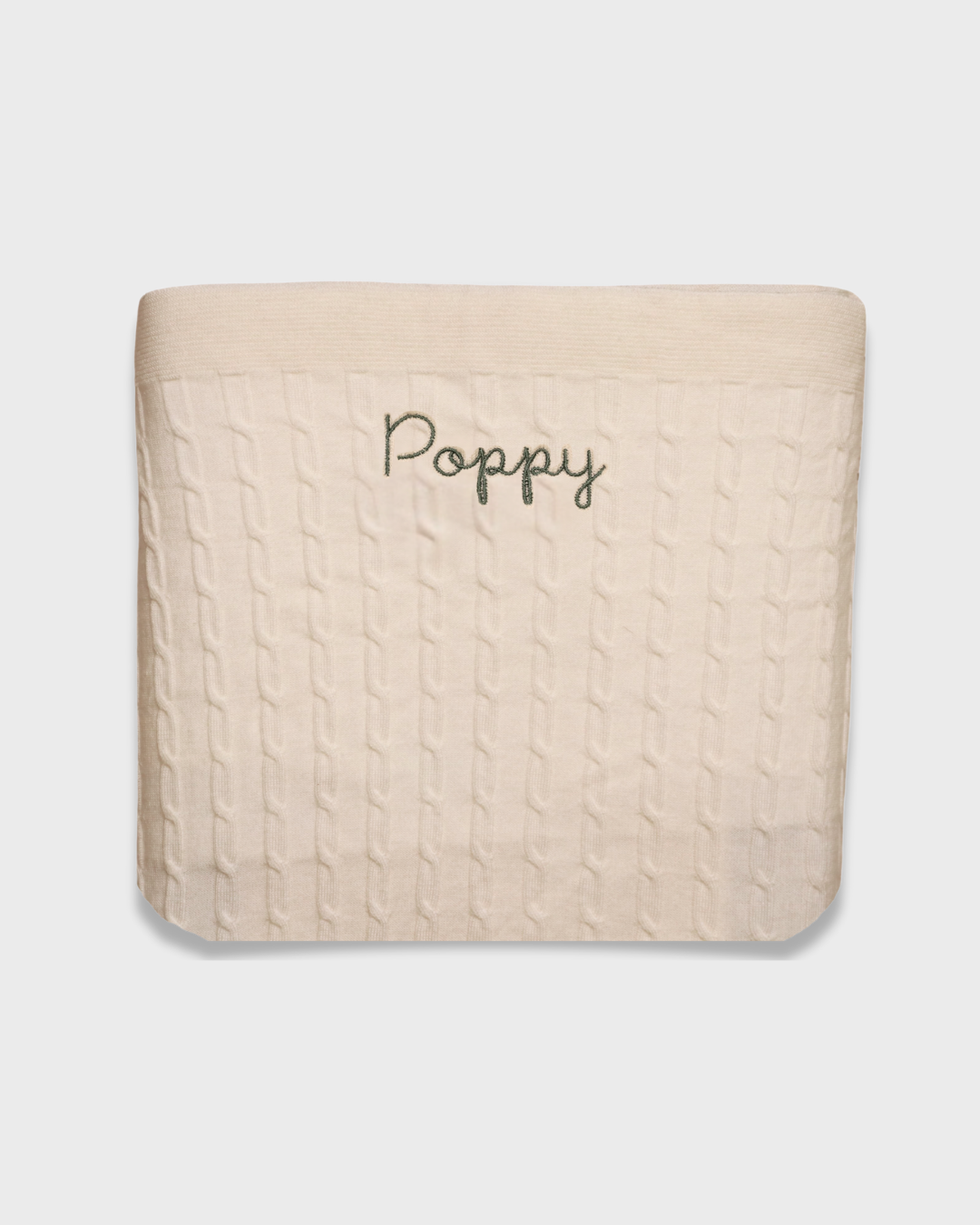 Merino baby blanket with personalized embroidery in soft wool fabric.
