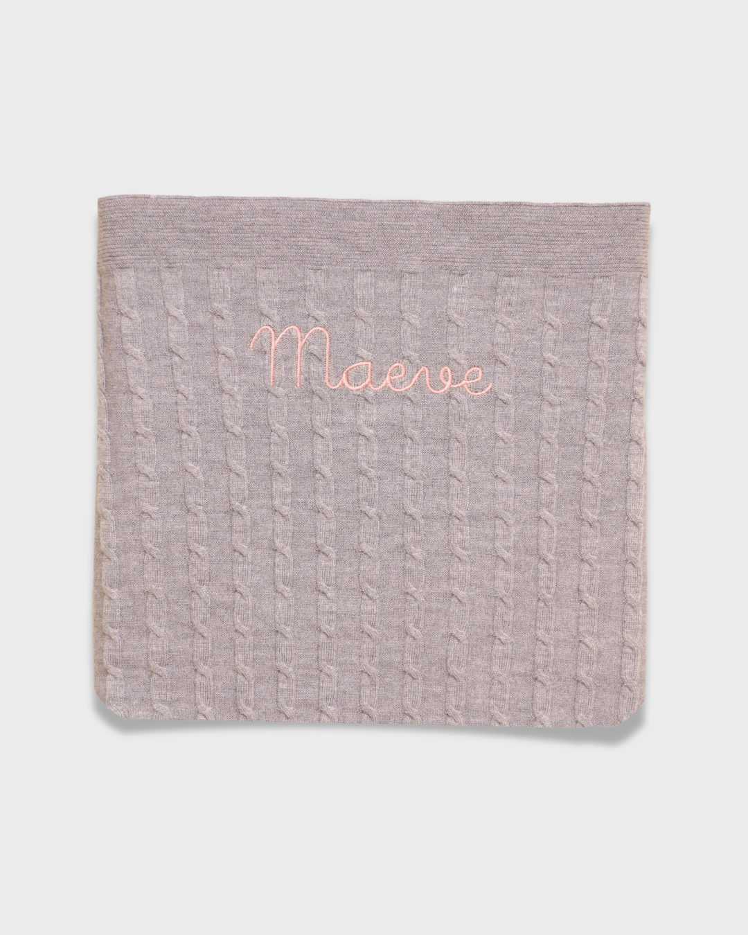 Merino wool baby blanket with personalized embroidery.