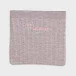 Merino wool baby blanket with personalized embroidery.