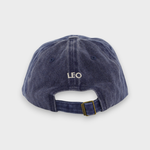 Airplane personalised hat with adjustable strap and custom embroidered name "LEO" on the back, made from 100% washed cotton.