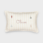 Nautical cushion with duck egg blue gingham linen, embroidered sea-themed designs, and personalized name "Olive"
