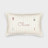 Nautical cushion with duck egg blue gingham linen, embroidered sea-themed designs, and personalized name "Olive"