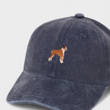 Navy washed cotton baseball cap with embroidered hand-drawn Boxer dog design, personalised embroidery option on back.