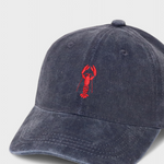 Navy blue personalised hat with red lobster embroidery and customisable back embroidery in block or script font