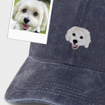 Custom Pet Hat with embroidered white dog portrait on washed cotton baseball cap, personalized with pet photo embroidery design.