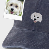 Custom Pet Hat with embroidered white dog portrait on washed cotton baseball cap, personalized with pet photo embroidery design.